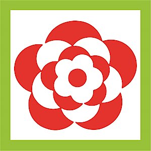 Stilisierte Blüte von oben, zusammengesetzt aus roten und weißen Kreisen, in mehreren farblich getrennten Schichten übereinander