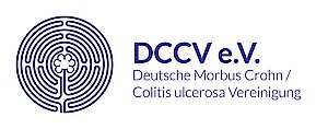 Das Bild zeigt das Logo des DCCV, ein mit violetten Strichen gezeichnetes Chartres-Labyrinth, in dessen Mitte eine Rosette zu sehen ist.